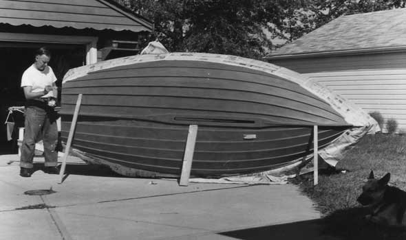 Robert painting Tinkerbelle in driveway in Willowick, circa 1964